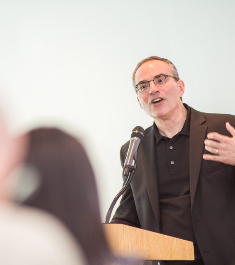 A picture of Mark Levy speaking
